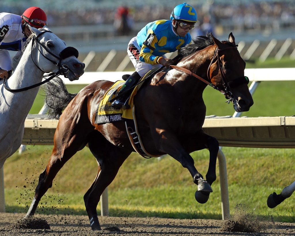 MONMOUTH NJ- AUGUST 2 Victor Espinoza rides atop American Pharoah #4 during the 48th William Hill Haskell Invitational at Monmouth Park