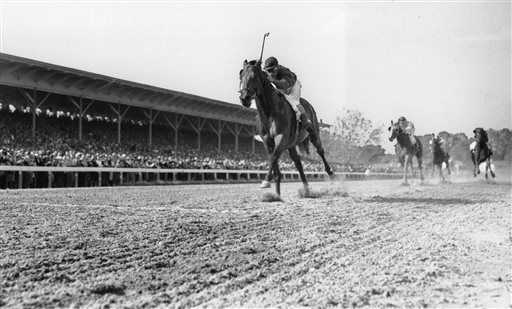 Citation ridden by Eddie Arcaro races home to win the $100,000 added Belmont Stakes Race and the Triple Crown at Belmont Park in Elmont N.Y. A little more than three weeks after winning the Triple Crown Citation