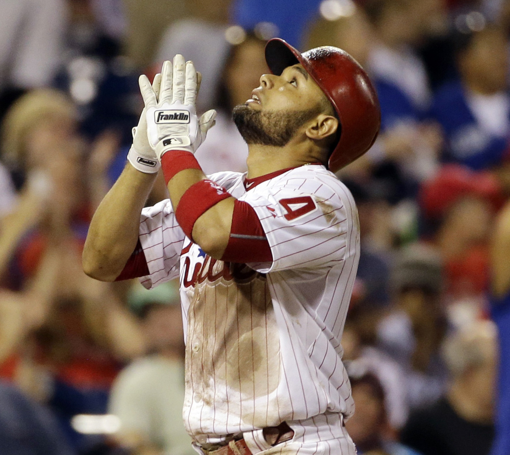 Andres Blanco reacts after hitting a fifth-inning home run Wednesday night against Toronto in Philadelphia. The Phillies won 7-4