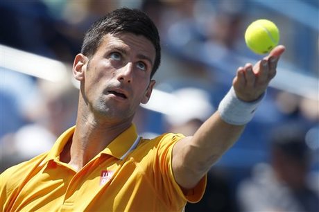 Djokovic romps to straight-sets win over Wawrinka