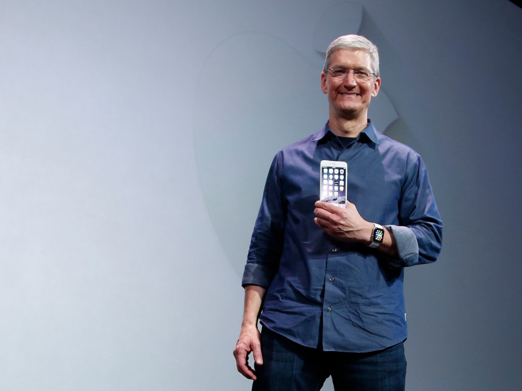 REUTERS Stephen Lam Apple CEO Tim Cook with the iPhone 6 Plus at an Apple event at the Flint Center in Cupertino California on September 9