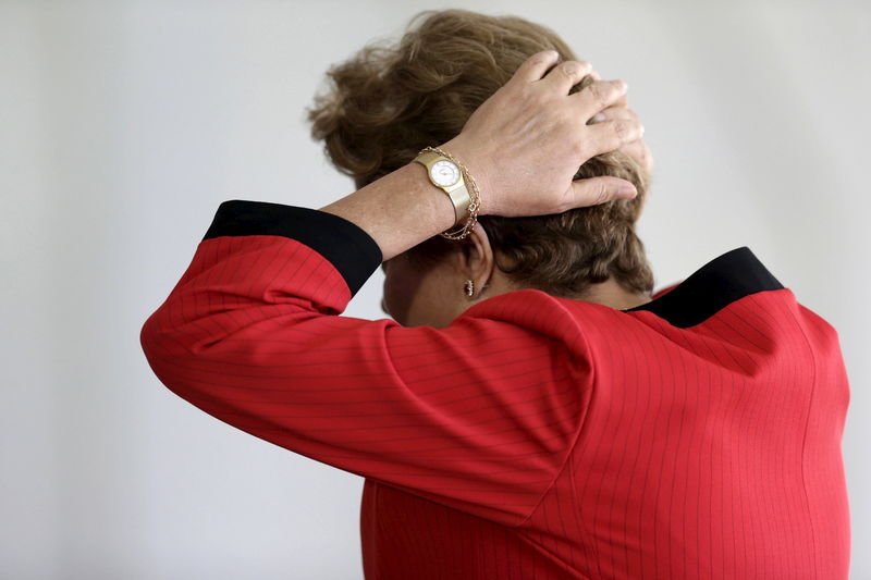 Brazilian President Dilma Rousseff reacts during a Summit of Heads of State of MERCOSUR and Associated States and Meeting of the Common Market Council in Brasilia in this