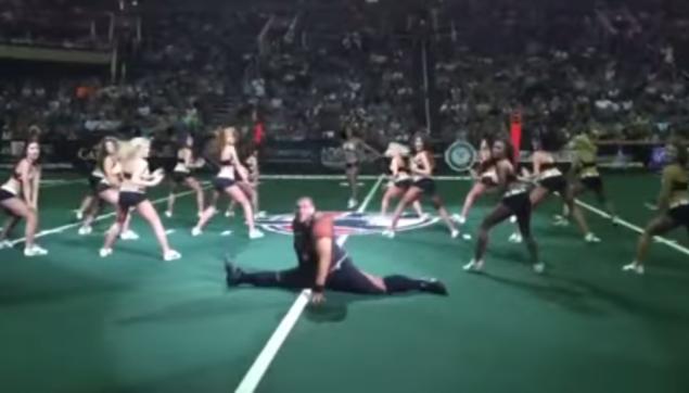 Arizona Rattlers dance team brings in a choreographer dressed as a football player to dance with them during their Aug 15 game