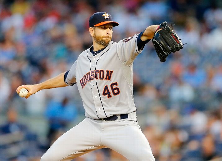 NEW YORK NY- AUGUST 24 Scott Feldman #46 of the Houston Astros pitches in the first inning against the New York Yankees at Yankee Stadium