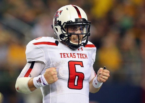 ARLINGTON TX- NOVEMBER 16 Baker Mayfield #6 of the Texas Tech Red Raiders celebrates his second touchdown pass against the Baylor Bears at AT&T Stadium