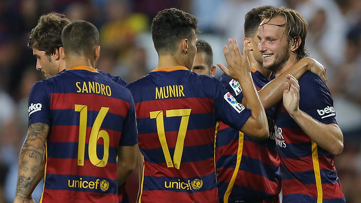 Barcelona's Ivan Rakitic celebrates after scoring his sides third goal against Roma in pre-season