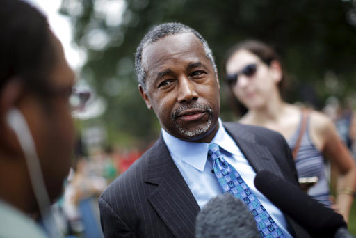 Republican presidential candidate Dr. Ben Carson talks to reporters after speaking at an event at Capitol Hill in Washington D.C