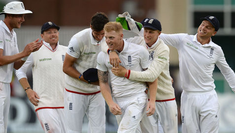 Ben Stokes is mobbed after claiming another wicket against Australia overnight