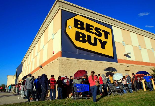 A customer gets help from an employee at a Best Buy store in San Francisco