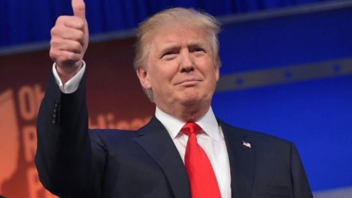 AFP  File | Donald Trump flashes the thumbs-up as he arrives on stage for the start of the prime time Republican presidential debate