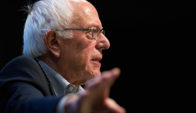 Democratic presidential candidate Senator Bernie Sanders speaks to guests at a town hall meeting at Valley High School