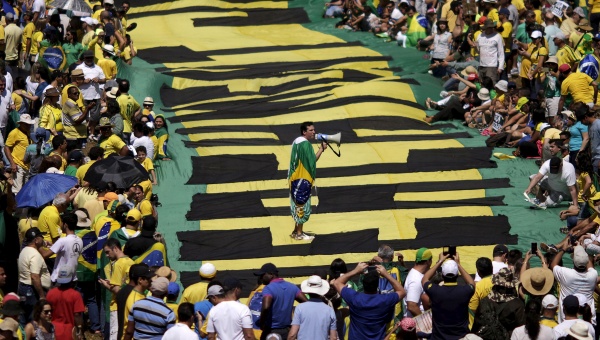 Demonstrators attend a protest against Brazil