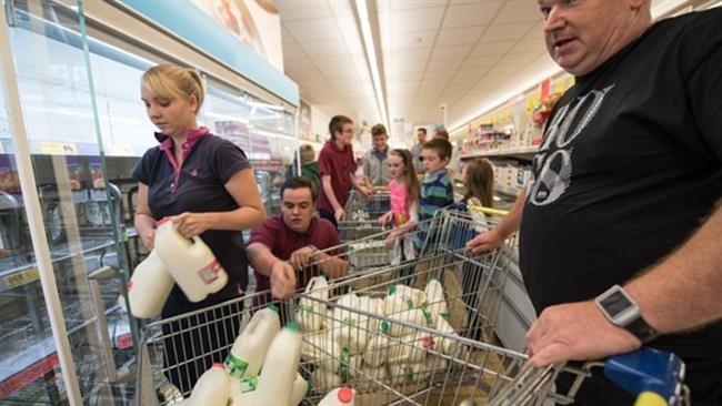 UK dairy farmers buy all the milk at a supermarket in protest of the falling milk price from processors