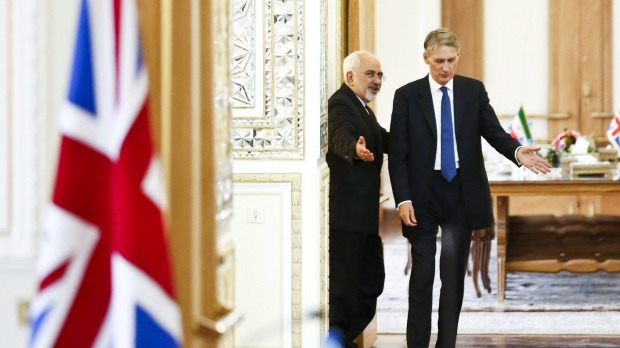 British Foreign Secretary Philip Hammond with Iranian counterpart Mohammad Javad Zarif after a meeting at the Ministry of Foreign Affairs in Tehran