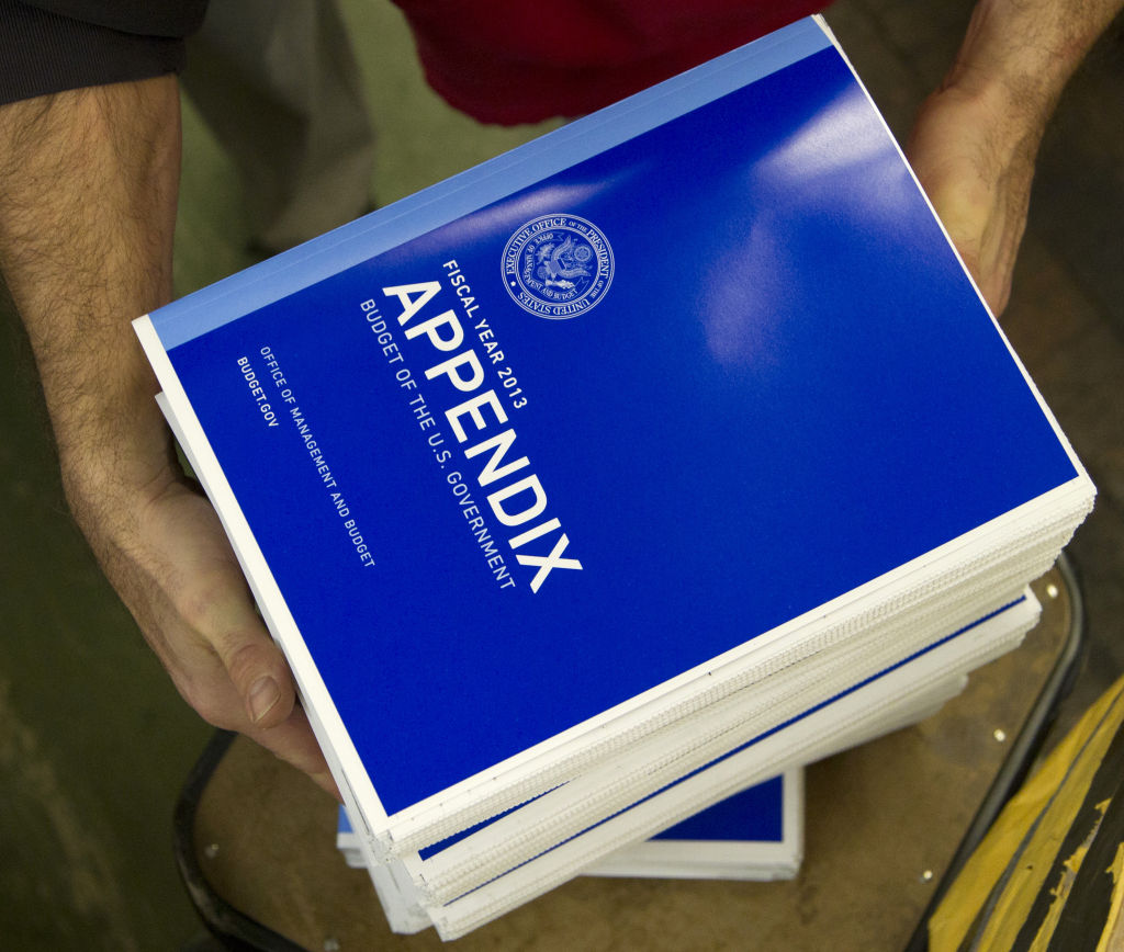 Copies of the appendix of President Barack Obama's fiscal 2013 federal budget are readied at the Government Printing Office in this February 2012 file