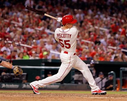 St. Louis Cardinals Stephen Piscotty hits an RBI-single during the seventh inning of a baseball game against the Colorado Rockies Saturday Aug. 1 2015 in St. Louis