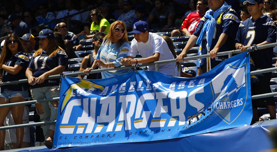 Chargers fans wait at then end of team practice duirng Fan Fest 2015 to meet the players for autographs