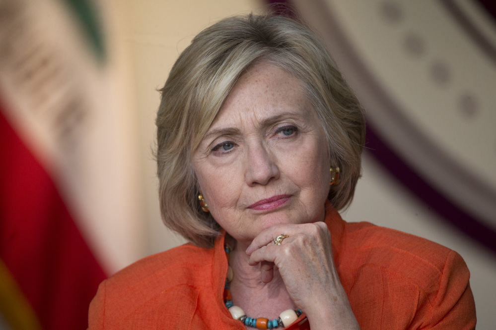 Democratic presidential candidate Hillary Rodham Clinton listens to a home care worker during a roundtable discussion in Los Angeles