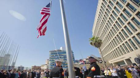 Kerry in Cuba as flag raised over US Embassy