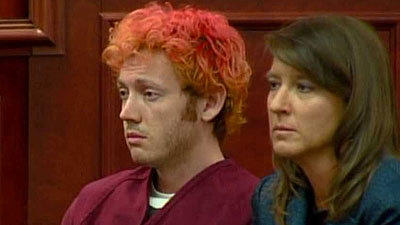 In this image taken from video accused Colorado theater shooter James Holmes standing on the far left listens as the verdict is read during his trial in Centennial Colorado