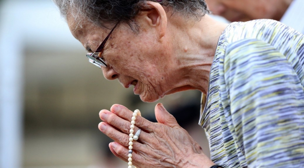 On Sept. 5 1945 the skeleton of a Catholic Church foreground and an unidentified building center were all that remained at the blast center area after the United States dropped an atomic bomb on Hiroshima Japan