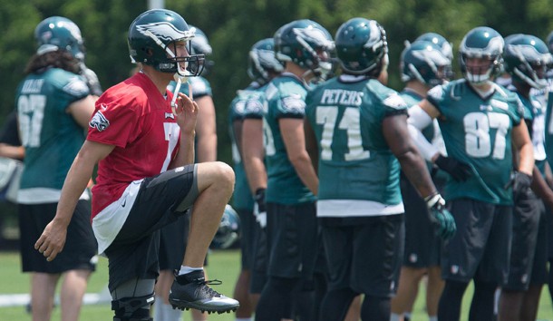 Philadelphia Eagles quarterback Sam Bradford loosens up during OTA's at the Nova Care Complex. Bill Streicher-USA TODAY Sports