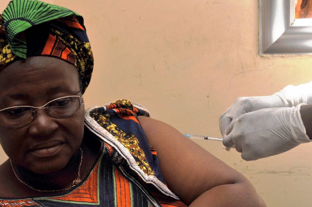 A woman receives the rVSV-ZEBOV Ebola vaccine at a clinical trial in Conakry Guinea. The vaccine appears effective after only one shot