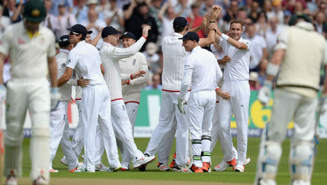 England players celebrate as another Australian batsman trudges back to the pavilion