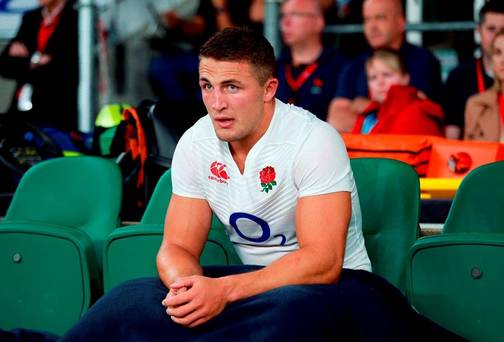 England's Sam Burgess sits on the bench after receiving a yellow card during the World Cup Warm Up match against France at Twickenham last week