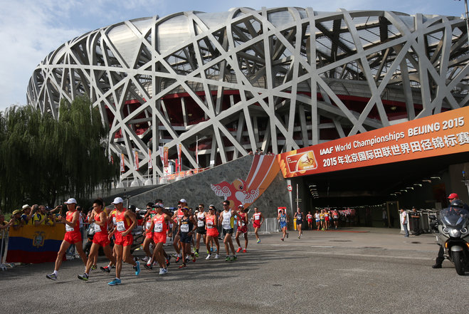 Competitors leave the Bird's Nest stadium near the start of the men's 20k race walk final at the World Athletics Championships in Beijing