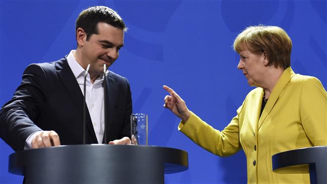 German Chancellor Angela Merkel and Greek Prime Minister Alexis Tsipras after a press conference following talks at the chancellery in Berlin