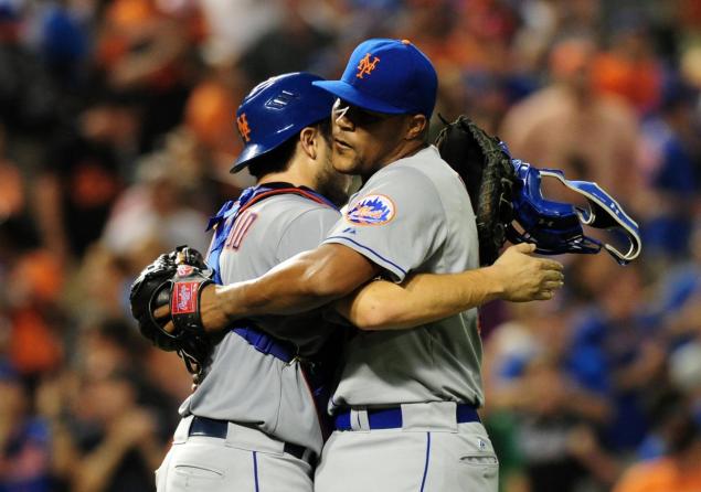 Jeurys Familia hangs on to the Mets lead Tuesday and gets a hug from catcher Travis d'Arnaud