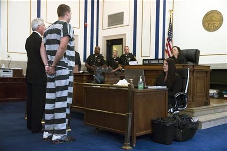 Former University of Cincinnati police officer Ray Tensing second from left appears before Judge Megan Shanahan at Hamilton County Courthouse for his arraignment in the shooting death of motorist Samuel DuBose Thursday