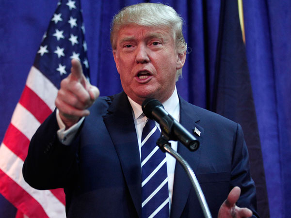 Republican presidential candidate Donald Trump speaks at a press conference before delivering the keynote address at the Genesee and Saginaw Republican Party Lincoln Day Event Aug. 11 2015 in Birch Run Michigan