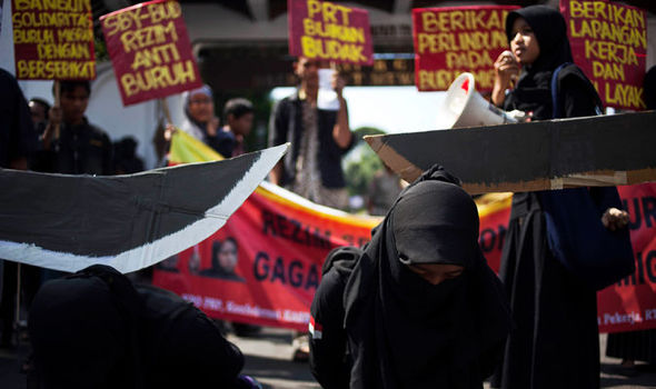 A protest is held following the execution of a maid in Saudi Arabia