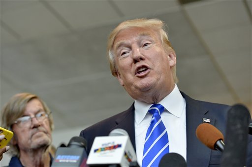 Republican presidential candidate Donald Trump answers questions from the media after speaking at a rally at the TD Convention Center Thursday Aug. 27 2015 in Greenville S.C