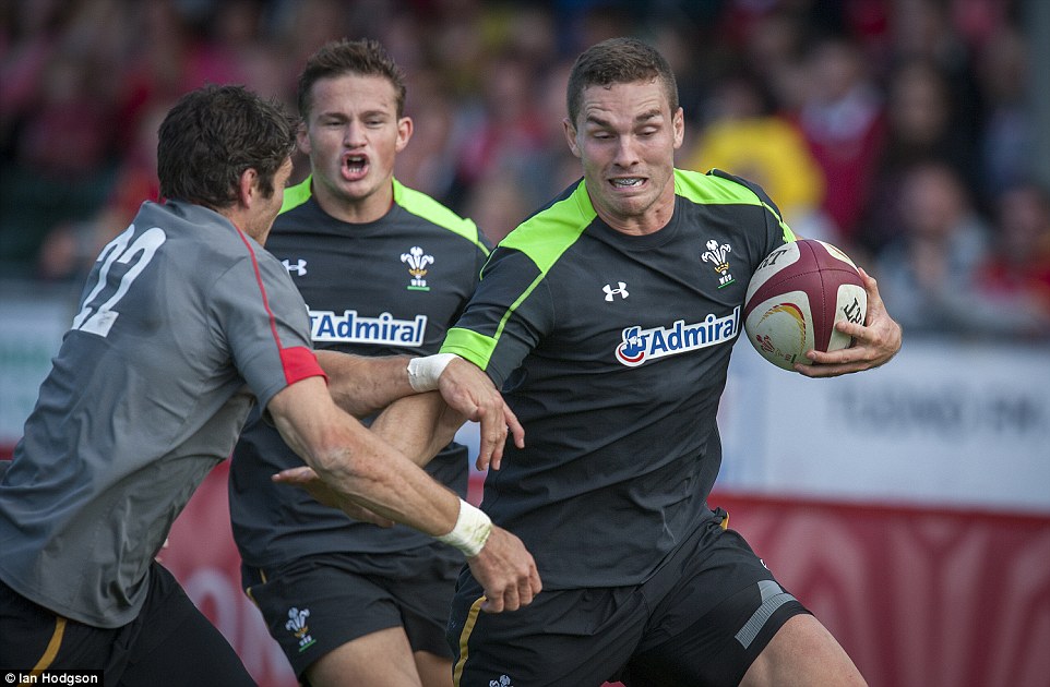 George North runs with the ball during a trial match as Wales continued their World Cup preparations in Colwyn Bay