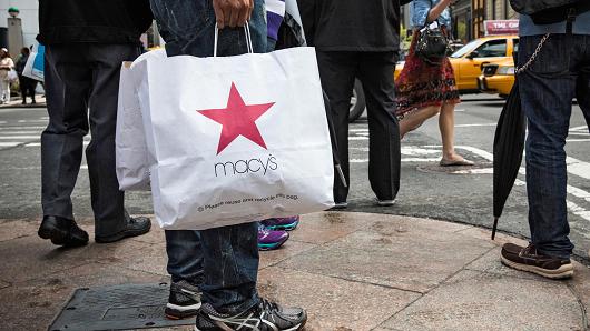 A shopper with a Macy's bag in New York