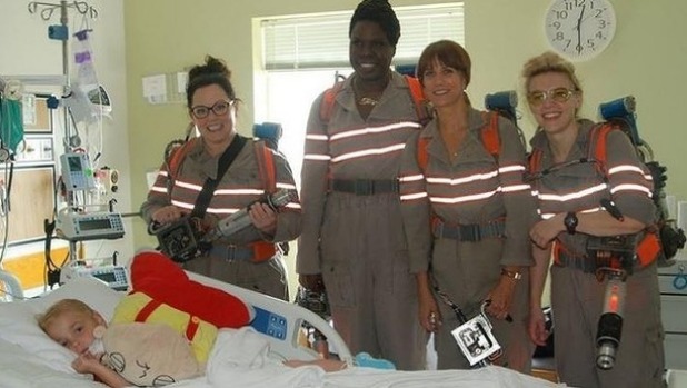 The female cast of the new Ghostbusters film Melissa Mc Carthy Leslie Jones Kristen Wiig and Kate Mc Kinnon and visited sick children over the weekend