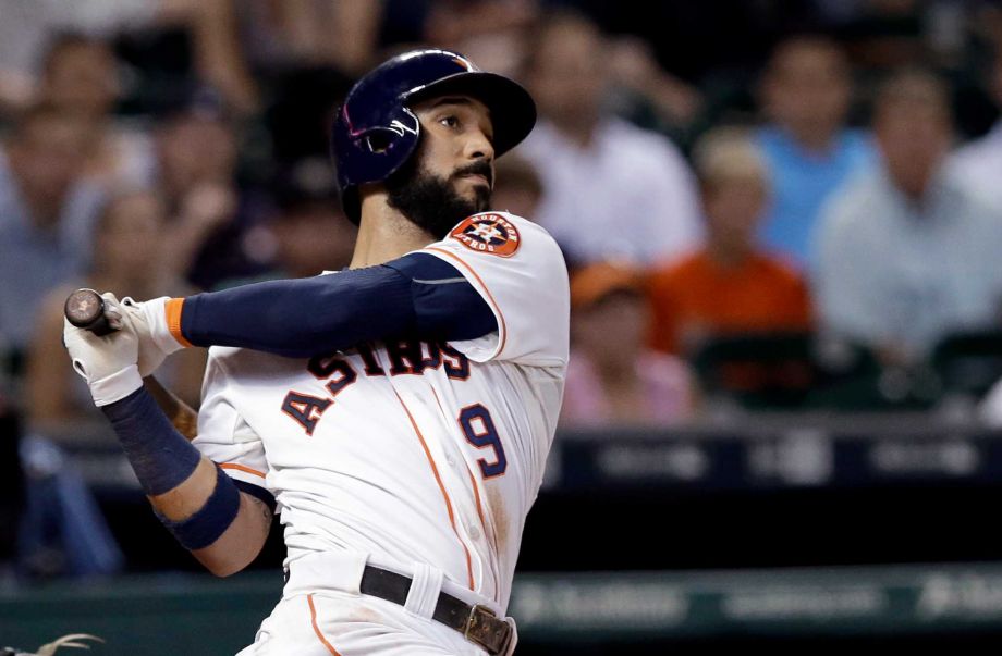 Houston Astros Marwin Gonzalez watches his walk-off home run in the 10th inning of a baseball game against the Tampa Bay Rays Ton uesday Aug. 18 2015 in Houston. The Astros won 3-2