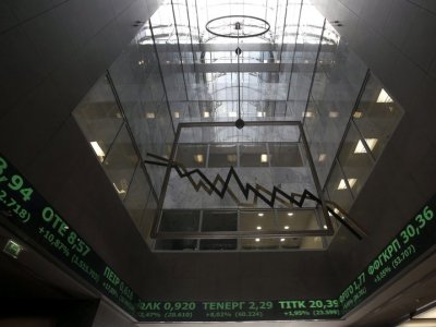 Board with share prices at Athens Stock Exchange