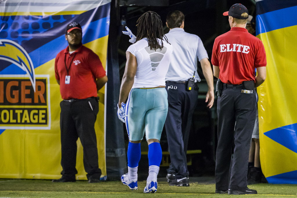 Dallas Cowboys running back Gus Johnson leaves the field during the third quarter of an NFL preseason football game at Qualcomm Stadium on Thursday Aug. 13 2015 in San Diego Calif