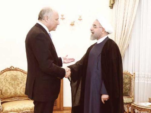 France seeks to warm up Iran ties with Rohani invite