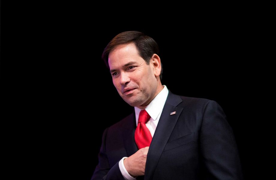 Republican presidential candidate Sen. Marco Rubio R-Fla. steps on the stage to speak at the Red State Gathering in Atlanta. Rubio will lay out a strategy on Friday Aug. 14 to deal with the'tyrannical regimes