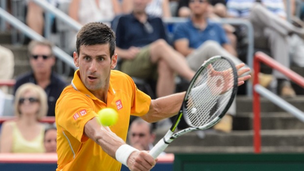 High times Novak Djokovic of Serbia hits a return against Jeremy Chardy of France during day six of the Rogers Cup