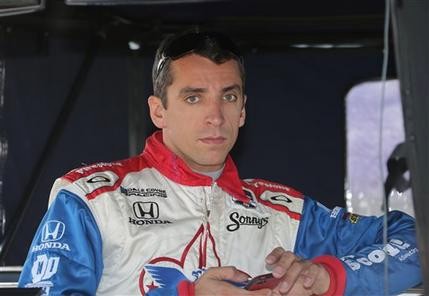 Justin Wilson shown in 2014 died Monday night from a head injury suffered when a piece of debris struck him at Pocono Raceway. His brother said he has donated organs to six people