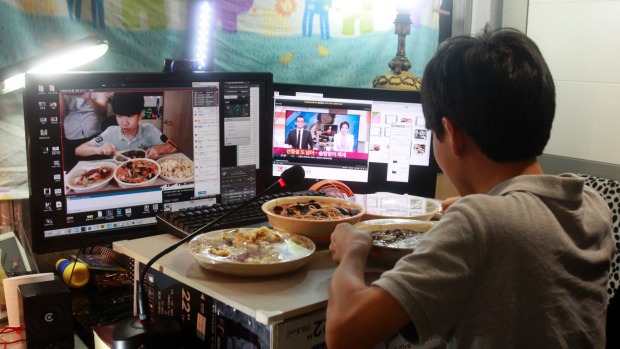 Kim Sungjin 14 broadcasts himself eating delivery Chinese food in his room at home in Bucheon south of Seoul