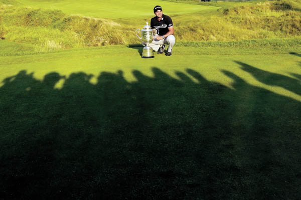 Jason Day poses with the Wanamaker Trophy after winning the PGA Championship at Whistling Straits in Haven Wisconsin