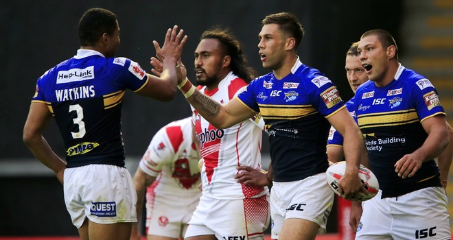 Joel Moon is congratulated by Kallum Watkins after scoring Leeds second try