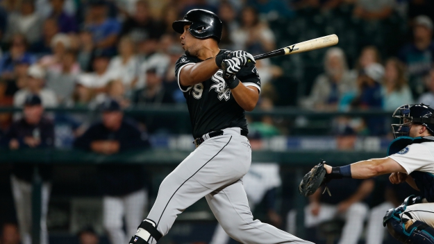 Jose Abreu hits a double in the tenth inning against the Seattle Mariners at Safeco Field